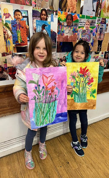 children with their flower arrangement art projects